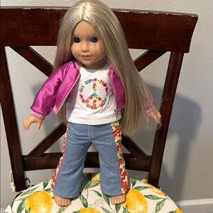 American Girl doll, blonde from 2017. Excellent condition. Flower child outfit